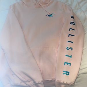 Hollister light pink hoodie in size M. Worn a few times.